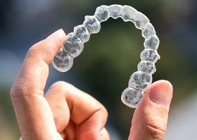 clear aligner representing cost of Invisalign in Irving
