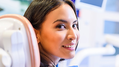 Smiling woman in dental chair