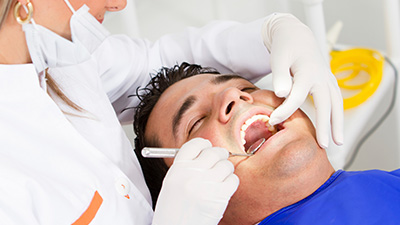 Man receiving dental exam