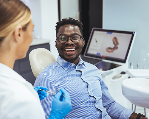 Man grinning at his dentist