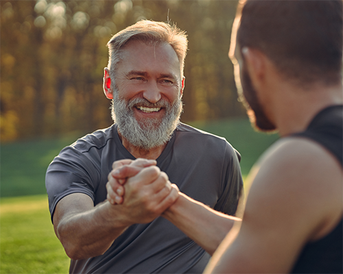 Two men exercising in a park