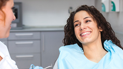 Smiling woman in dental chair