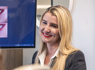 Doctor Bristow smiling at a patient