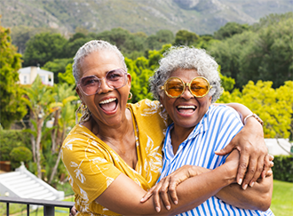 Two women embracing outdoors