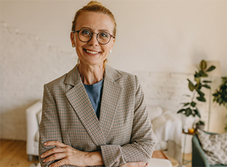 Woman in a tan blazer