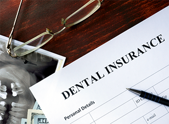 Dental insurance paperwork on a desk