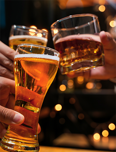 Toasting two glasses of beer