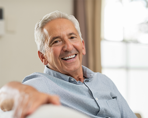 Senior man sitting on a couch