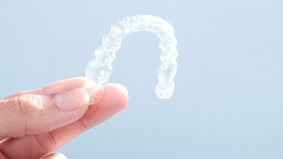  Close-up of Invisalign clear aligner