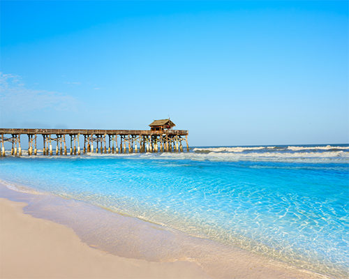 Beach with a boardwalk in the distance
