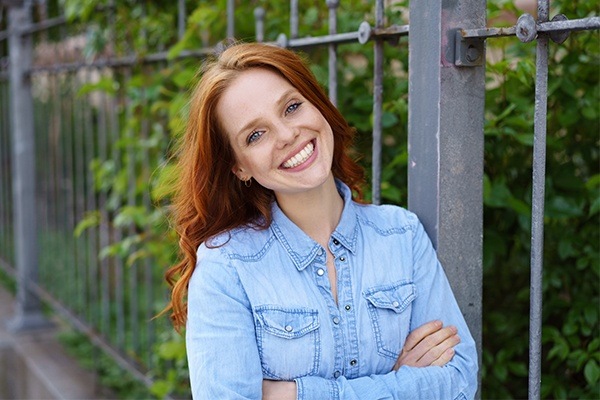 woman smiling outdoors