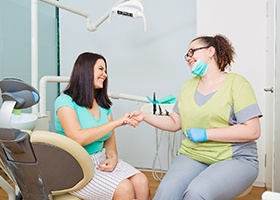 A woman thanking her dentist for nitrous oxide in Irving