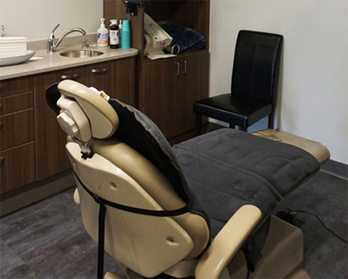 Soft-looking dental exam chair
