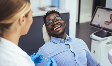 Man grinning at his dentist