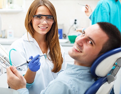 Smiling man in dental chair