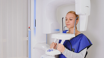 Woman receiving cone beam scan