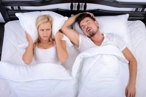 Man snoring keeping woman awake needs help with sleep apnea treatment irving residents love