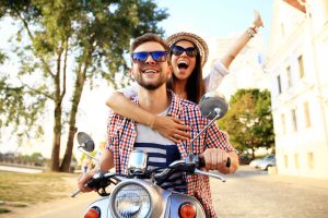 couple riding on a motorbike