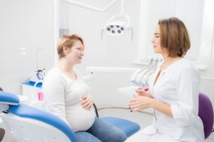 pregnant woman at dental checkup 