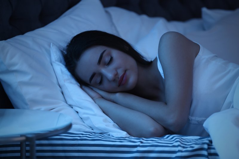 Woman sleeping in bed