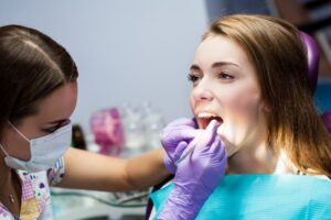 Woman getting her dental cleaning